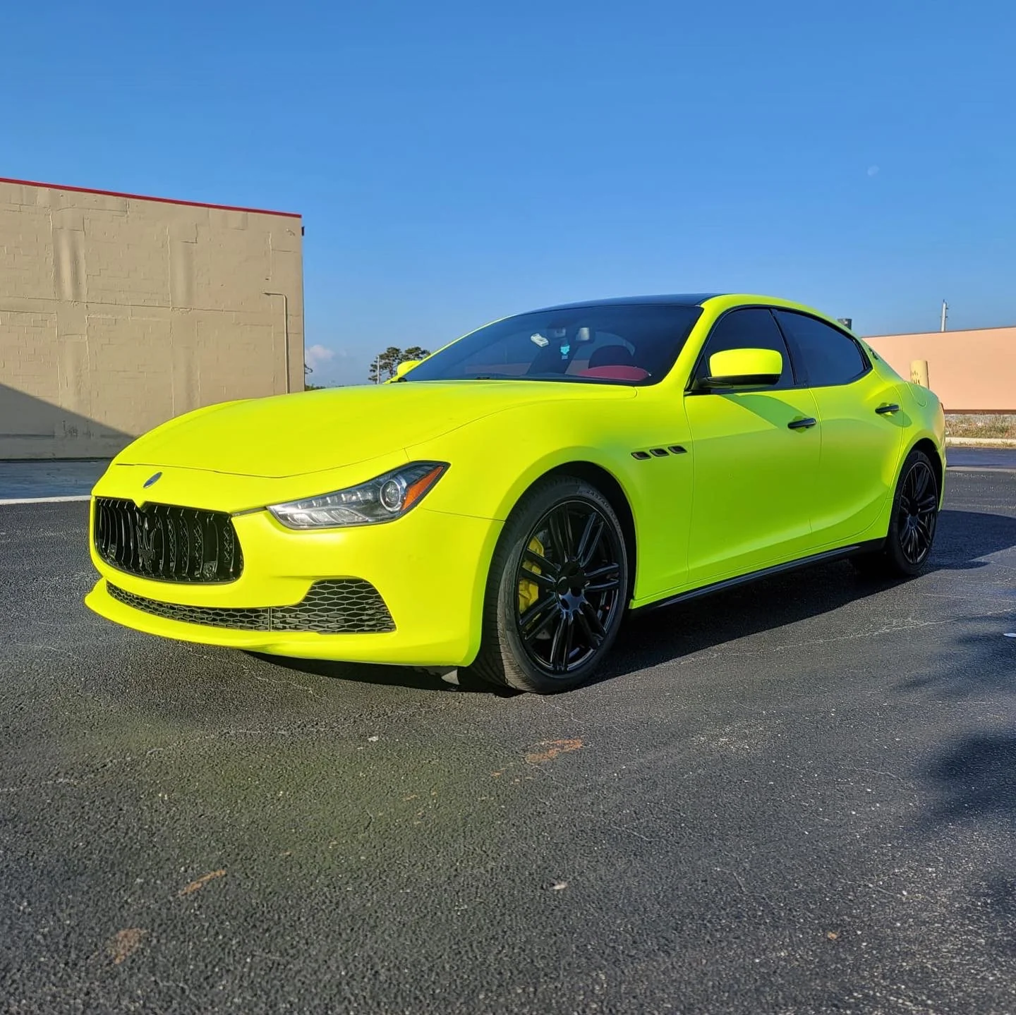 Inside Pf Auto Style | Wraps & Window tinting — wrap shop and install bay
